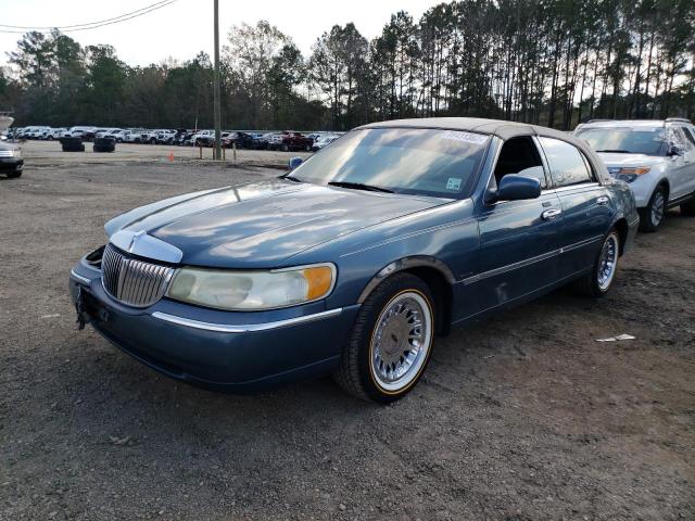 Photo 1 from auction – 2001 LINCOLN TOWN CAR E with VIN 1LNHM81W31Y672786