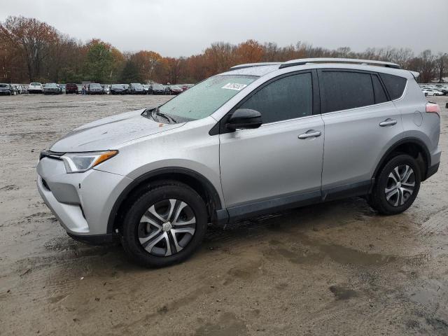 TOYOTA RAV4 LE 2018 with VIN 2T3ZFREV6JW518433 - Photo from auction