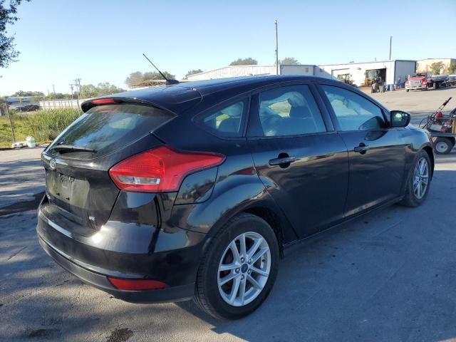 Photo 3 from auction – 2018 FORD FOCUS SE with VIN 1FADP3K22JL224860