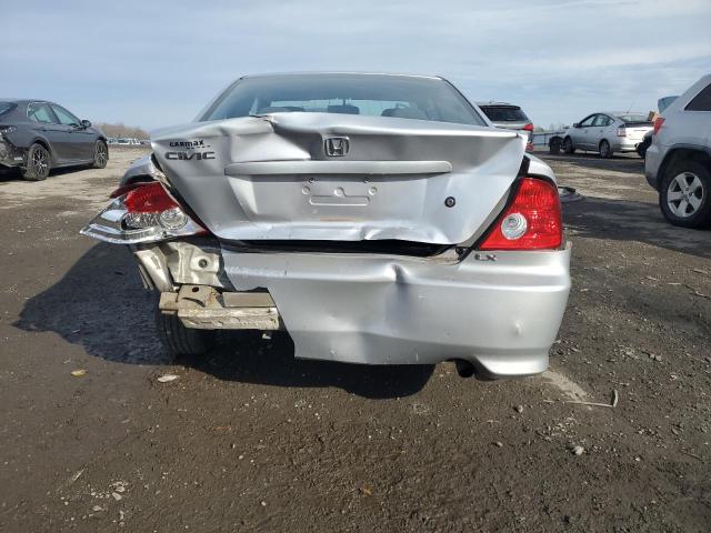Photo 6 from auction – 2004 HONDA CIVIC LX with VIN 1HGEM22644L069870