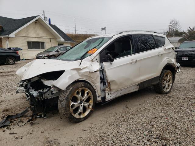 FORD ESCAPE TIT 2014 with VIN 1FMCU0JX1EUB25355 - Photo from auction