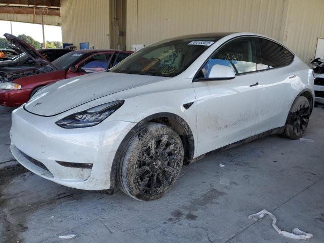 TESLA MODEL Y 2021 with VIN 5YJYGDEE0MF140034 - Photo from auction