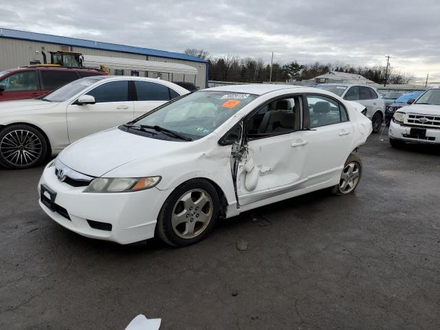 HONDA CIVIC LX 2011 with VIN 2HGFA1F50BH519355 - Photo from auction