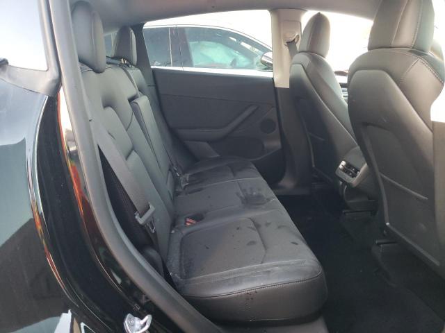 Photo 11 from auction – 2022 TESLA MODEL Y with VIN 7SAYGDEE9NF480030