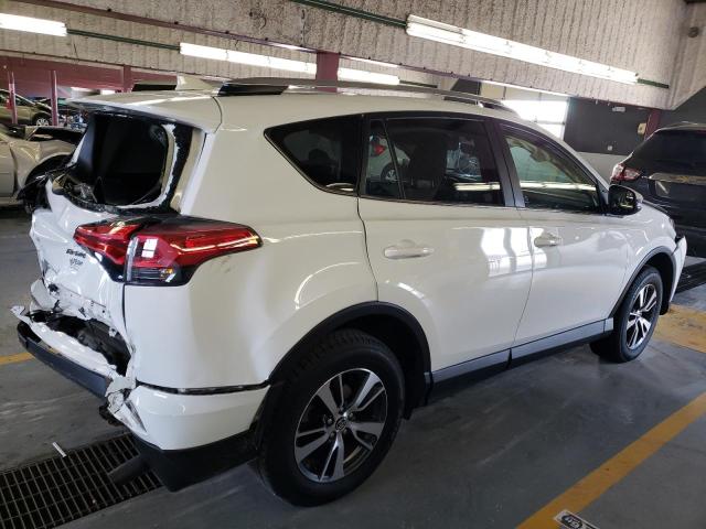 Photo 3 from auction – 2016 TOYOTA RAV4 XLE with VIN JTMRFREVXGJ086646