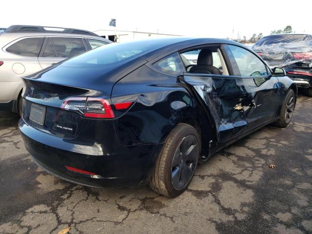 Photo 3 from auction – 2022 TESLA MODEL 3 with VIN 5YJ3E1EB1NF166549