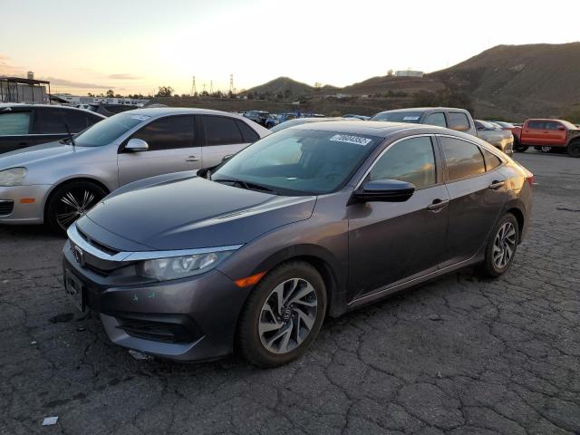 HONDA CIVIC EX 2017 with VIN 19XFC2F76HE015025 - Photo from auction