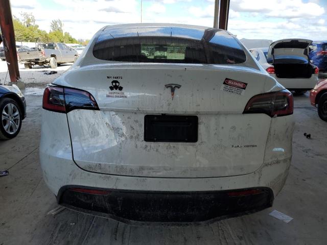 Photo 6 from auction – 2021 TESLA MODEL Y with VIN 5YJYGDEE0MF140034