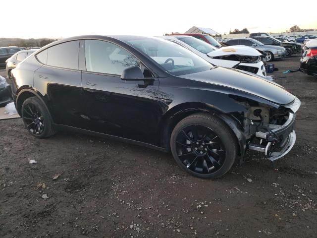 Photo 4 from auction – 2022 TESLA MODEL Y with VIN 7SAYGDEE9NF480030