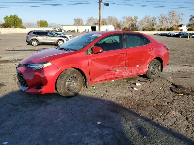TOYOTA COROLLA L 2018 with VIN 5YFBURHE6JP774584 - Photo from auction