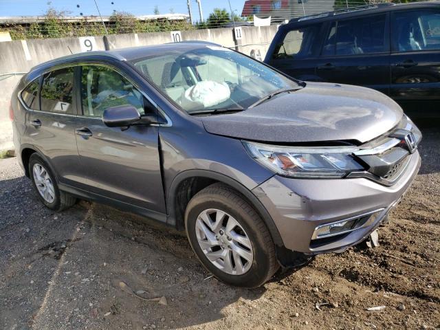 Photo 4 from auction – 2015 HONDA CR-V EXL with VIN 2HKRM3H73FH523040