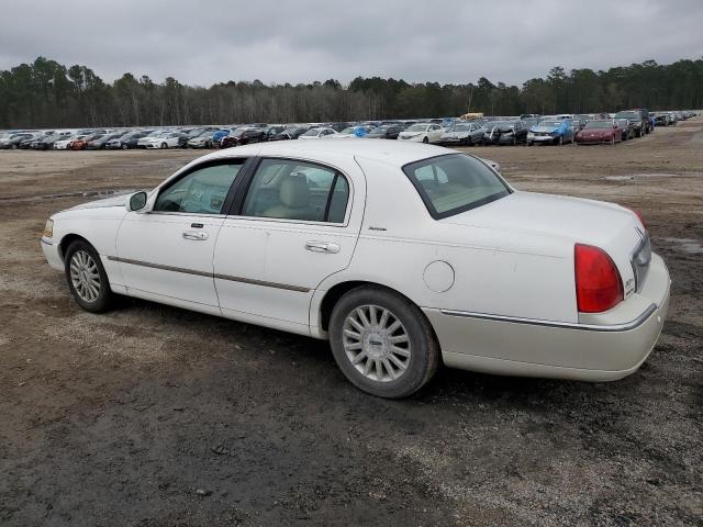 Photo 2 from auction – 2004 LINCOLN TOWN CAR E with VIN 1LNHM81WX4Y675351