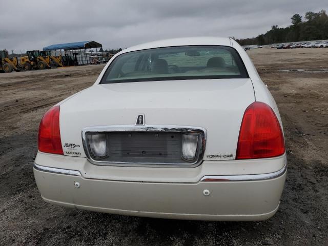 Photo 6 from auction – 2004 LINCOLN TOWN CAR E with VIN 1LNHM81WX4Y675351