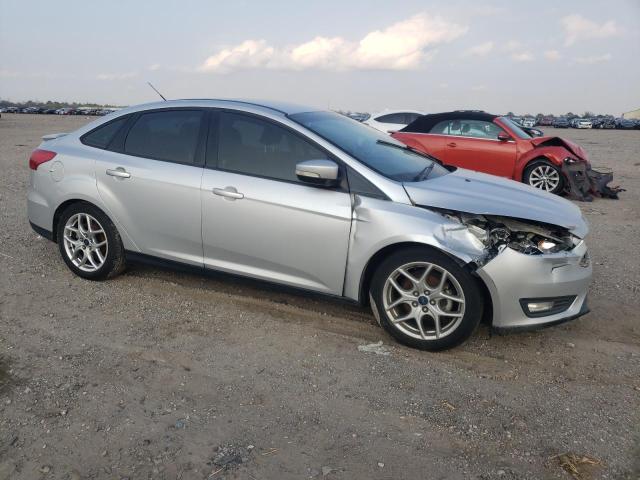 Photo 4 from auction – 2015 FORD FOCUS with VIN 1FADP3F2XFL314145
