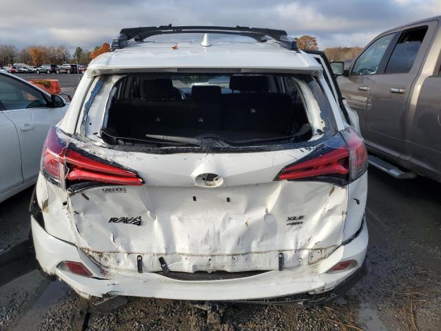 Photo 6 from auction – 2017 TOYOTA RAV4 XLE with VIN JTMRFREV4HJ116726