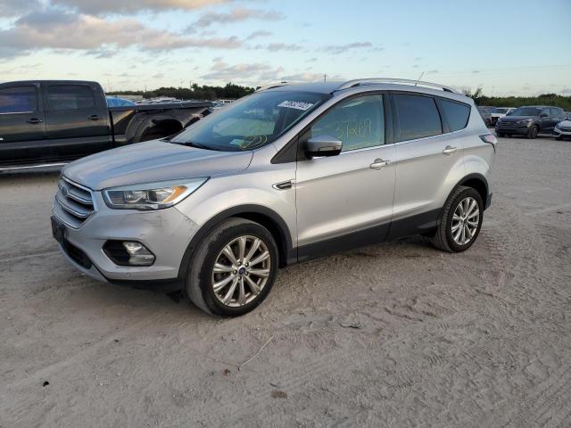 FORD ESCAPE TIT 2017 with VIN 1FMCU9J94HUA63637 - Photo from auction