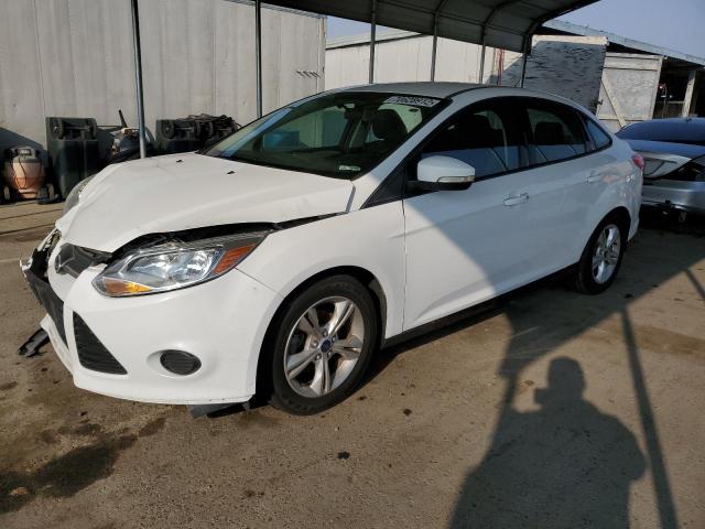FORD FOCUS SE 2014 with VIN 1FADP3F24EL363291 - Photo from auction