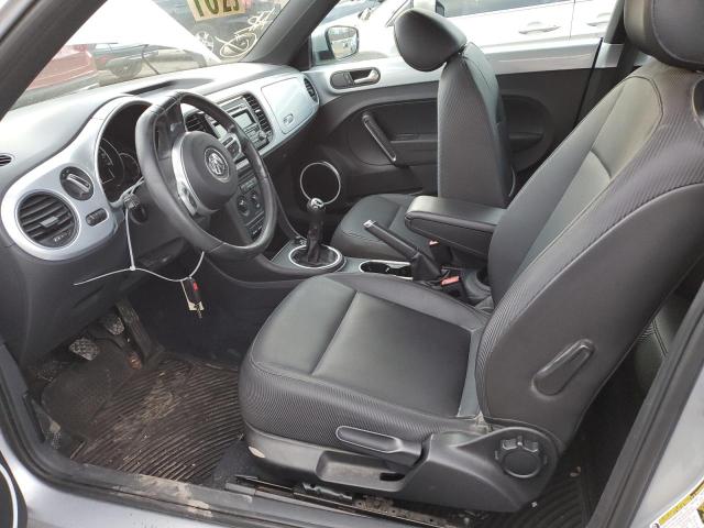 Photo 7 from auction – 2014 VOLKSWAGEN BEETLE with VIN 3VWHP7AT1EM609230