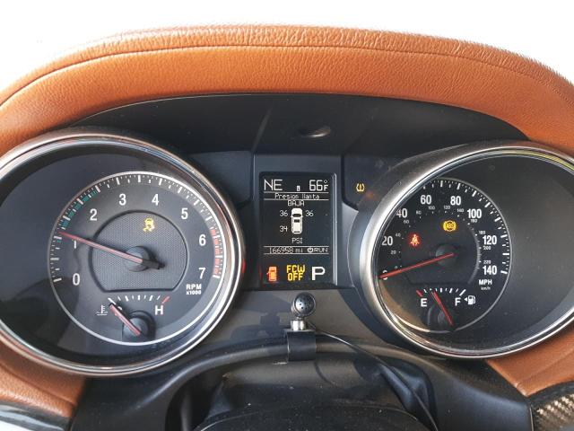 Photo 9 from auction – 2012 JEEP GRAND CHER with VIN 1C4RJECT1CC330224