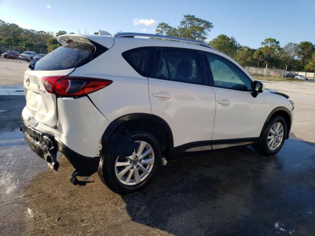 Photo 3 from auction – 2014 MAZDA CX-5 TOURI with VIN JM3KE2CY9E0343380