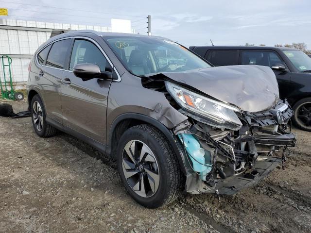 Photo 4 from auction – 2016 HONDA CR-V TOURI with VIN 5J6RM3H94GL019847