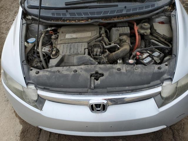 Photo 11 from auction – 2006 HONDA CIVIC HYBR with VIN JHMFA36256S024808