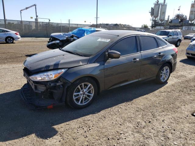 FORD FOCUS SE 2018 with VIN 1FADP3F28JL262328 - Photo from auction