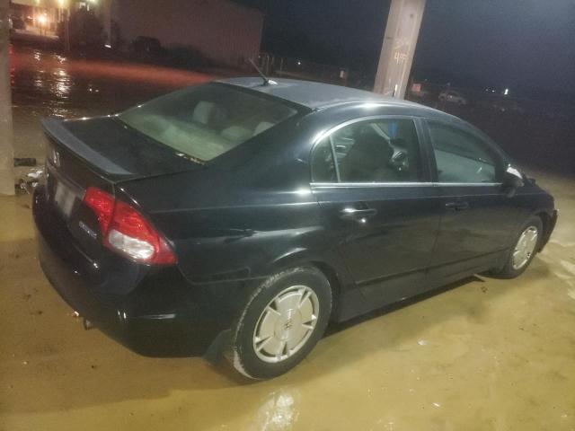 Photo 3 from auction – 2009 HONDA CIVIC HYBR with VIN JHMFA36239S008479