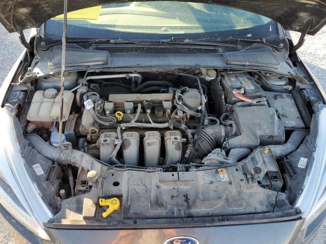 Photo 11 from auction – 2015 FORD FOCUS SE with VIN 1FADP3F21FL242302