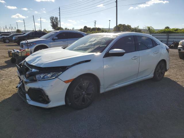 HONDA CIVIC EX 2018 with VIN SHHFK7H54JU235242 - Photo from auction