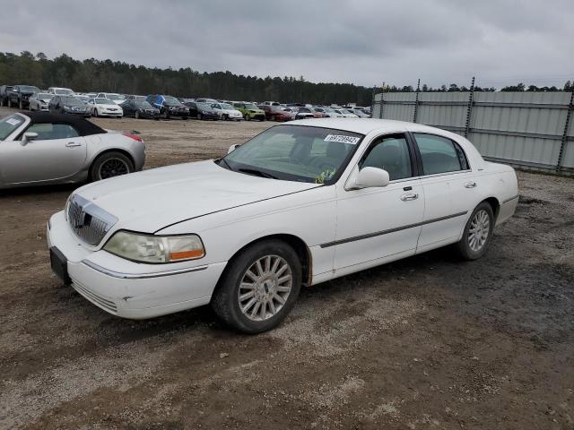 Photo 1 from auction – 2004 LINCOLN TOWN CAR E with VIN 1LNHM81WX4Y675351
