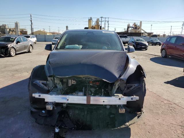 Photo 5 from auction – 2022 TESLA MODEL Y with VIN 7SAYGDEF6NF328828