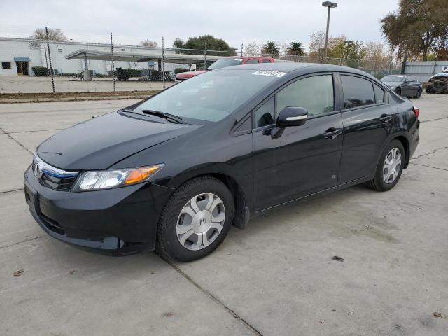 HONDA CIVIC HYBR 2012 with VIN JHMFB4F22CS010461 - Photo from auction
