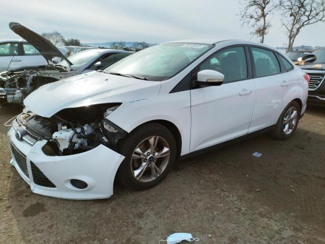 FORD FOCUS SE 2014 with VIN 1FADP3F24EL248240 - Photo from auction