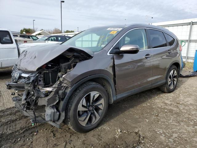 HONDA CR-V TOURI 2016 with VIN 5J6RM3H94GL019847 - Photo from auction
