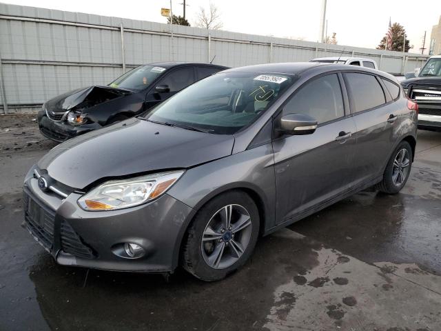 FORD FOCUS SE 2014 with VIN 1FADP3K20EL372303 - Photo from auction