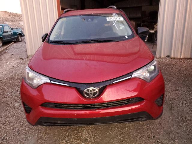 Photo 5 from auction – 2018 TOYOTA RAV4 LE with VIN 2T3ZFREV7JW480310