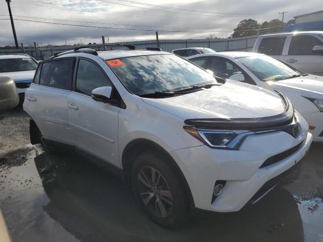 Photo 4 from auction – 2017 TOYOTA RAV4 XLE with VIN JTMRFREV4HJ116726
