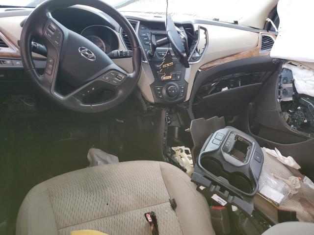 Photo 8 from auction – 2014 HYUNDAI SANTA FE S with VIN 5XYZU3LB2EG190895