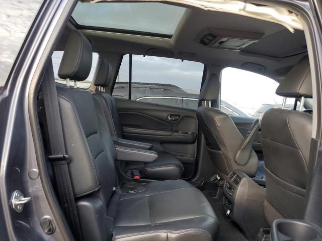 Photo 11 from auction – 2018 HONDA PILOT ELIT with VIN 5FNYF6H04JB030811