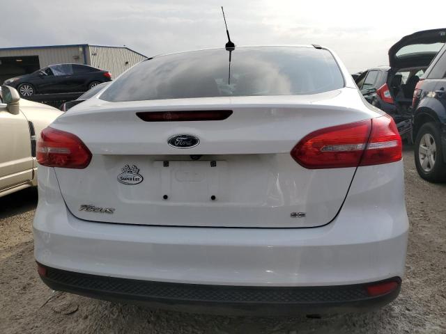 Photo 6 from auction – 2018 FORD FOCUS SE with VIN 1FADP3F28JL259137