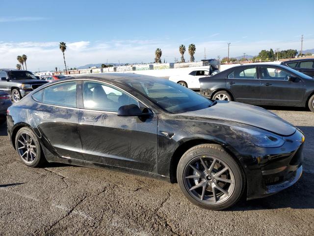 Photo 4 from auction – 2022 TESLA MODEL 3 with VIN 5YJ3E1EB2NF234695