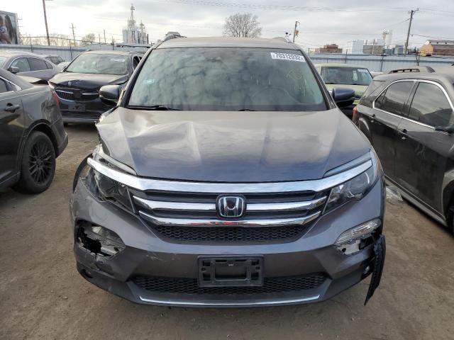 Photo 5 from auction – 2018 HONDA PILOT ELIT with VIN 5FNYF6H04JB030811