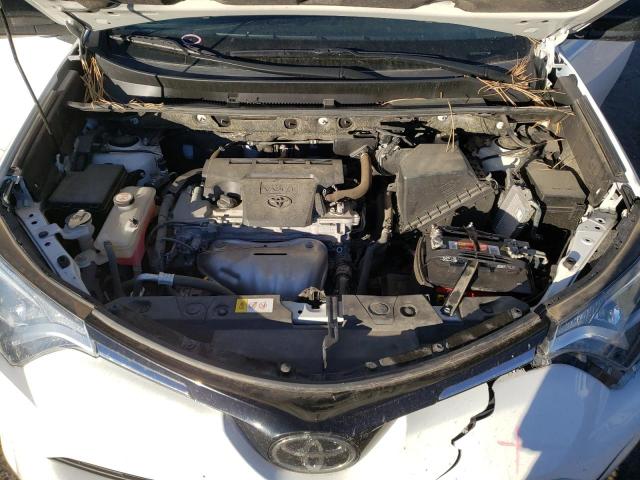Photo 11 from auction – 2018 TOYOTA RAV4 LE with VIN JTMZFREV3JJ733086