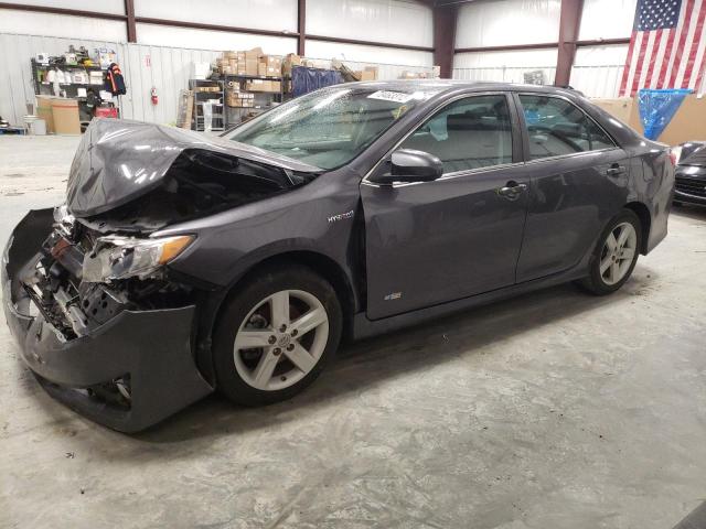 TOYOTA CAMRY HYBR 2014 with VIN 4T1BD1FKXEU136076 - Photo from auction