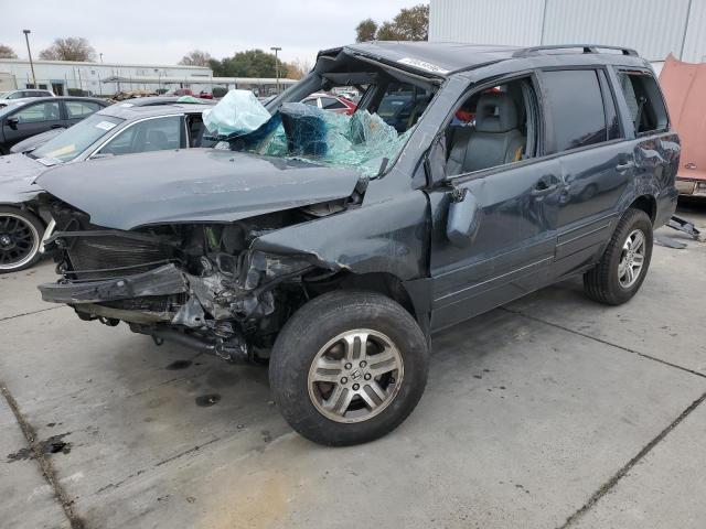 HONDA PILOT EXL 2004 with VIN 2HKYF18774H621768 - Photo from auction