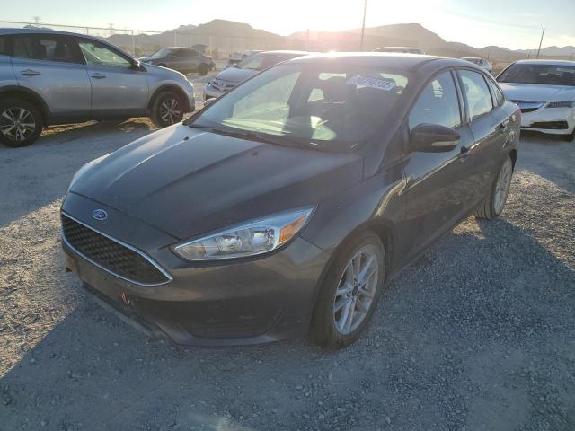 FORD FOCUS SE 2015 with VIN 1FADP3F21FL242302 - Photo from auction