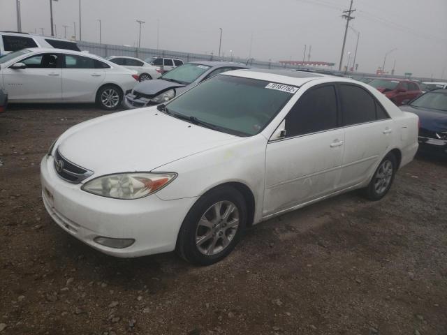 TOYOTA CAMRY LE 2004 with VIN JTDBE30K140283950 - Photo from auction