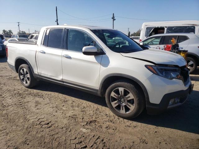Photo 4 from auction – 2017 HONDA RIDGELINE with VIN 5FPYK3F78HB028121