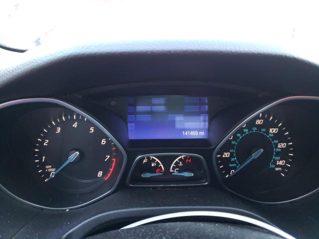 Photo 9 from auction – 2013 FORD FOCUS SE with VIN 1FADP3F27DL270148